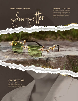 Glasses with green lenses and gold frames on a rock, with 'glow-getter' magazine cover design in the background.