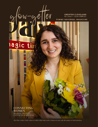 Woman in yellow blazer holding flowers on the cover of 'Glow Getter' magazine