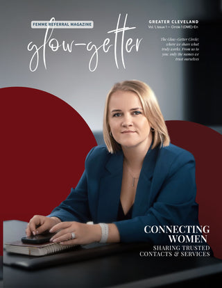 Woman using a smartphone with 'Femme Referral Magazine' branding on a dark background