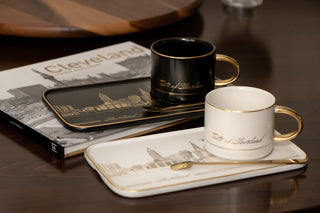 Cleveland-themed mug and tray set on a wooden surface
